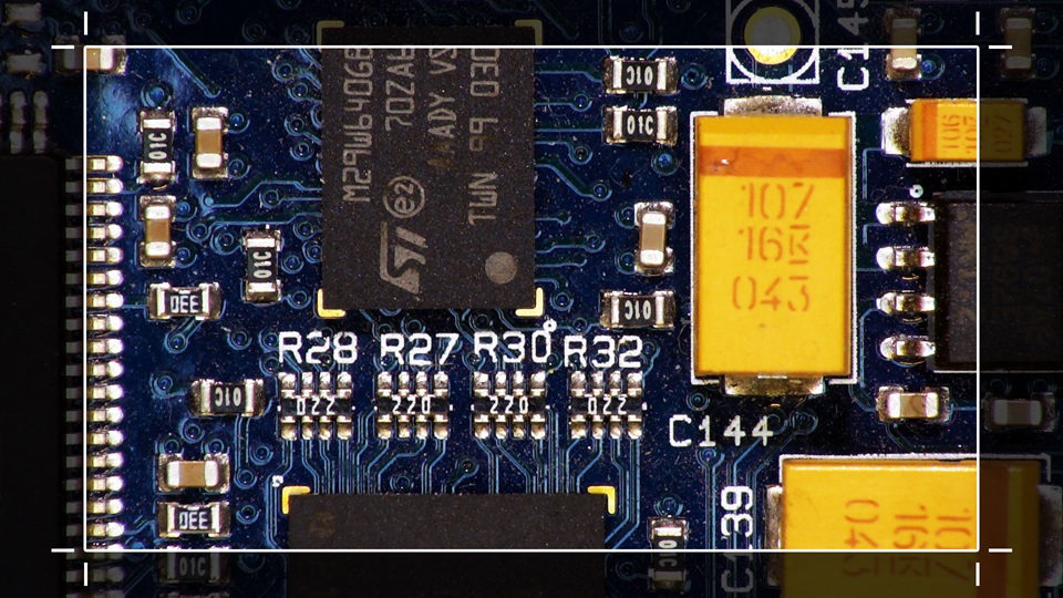 A magnified PCB with a cropping overlay to only show a certain area of the PCB