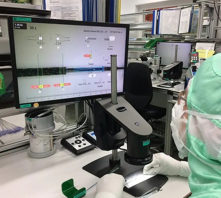 Operator using a TAGARNO PRESTIGE to inspect medical devices
