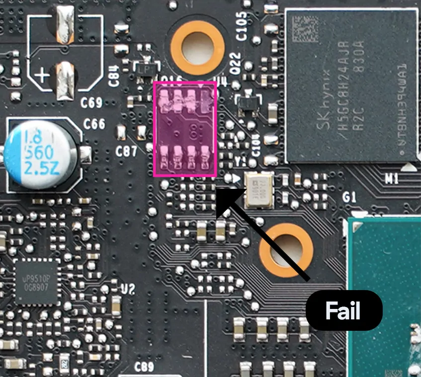 Magnified PCB with pink box outlining area of the board with an annotation saying Fail and arrow pointing towards the highlighted area